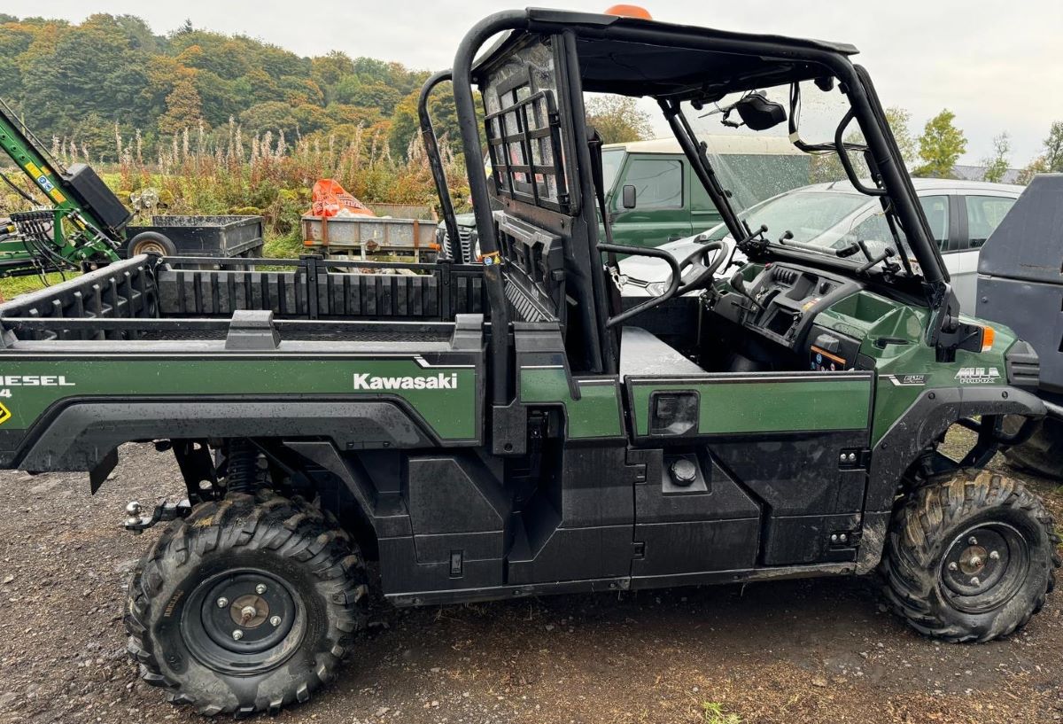 Kawasaki Mule 4 by 4 with loader angled